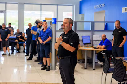 Flow Honda in Winston-Salem Man Standing with Arms Open