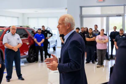 Flow Honda in Winston-Salem Group Man Giving a Speech